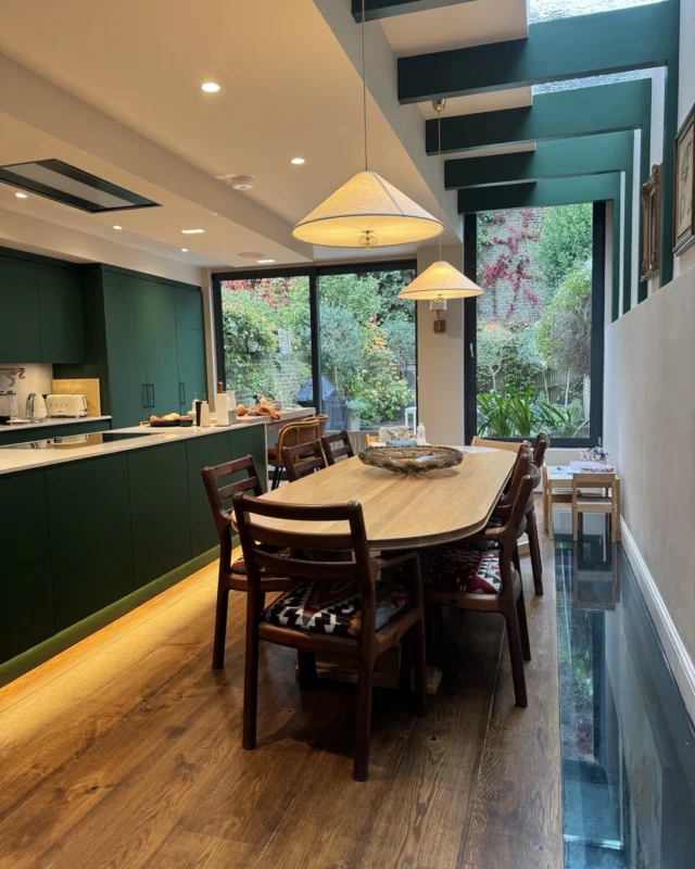 Racing green kitchen with sanded and stained joinery